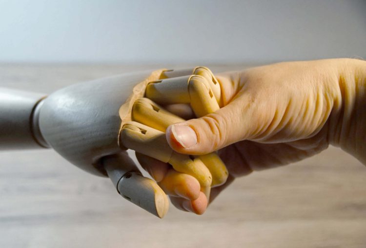 Holzhand reichen und schütteln und halten