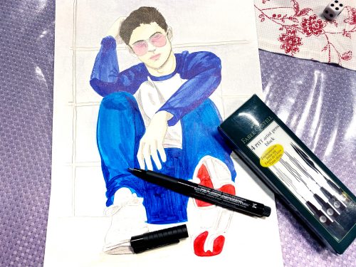 Sitzender Mann mit Ohuhu Markern malen