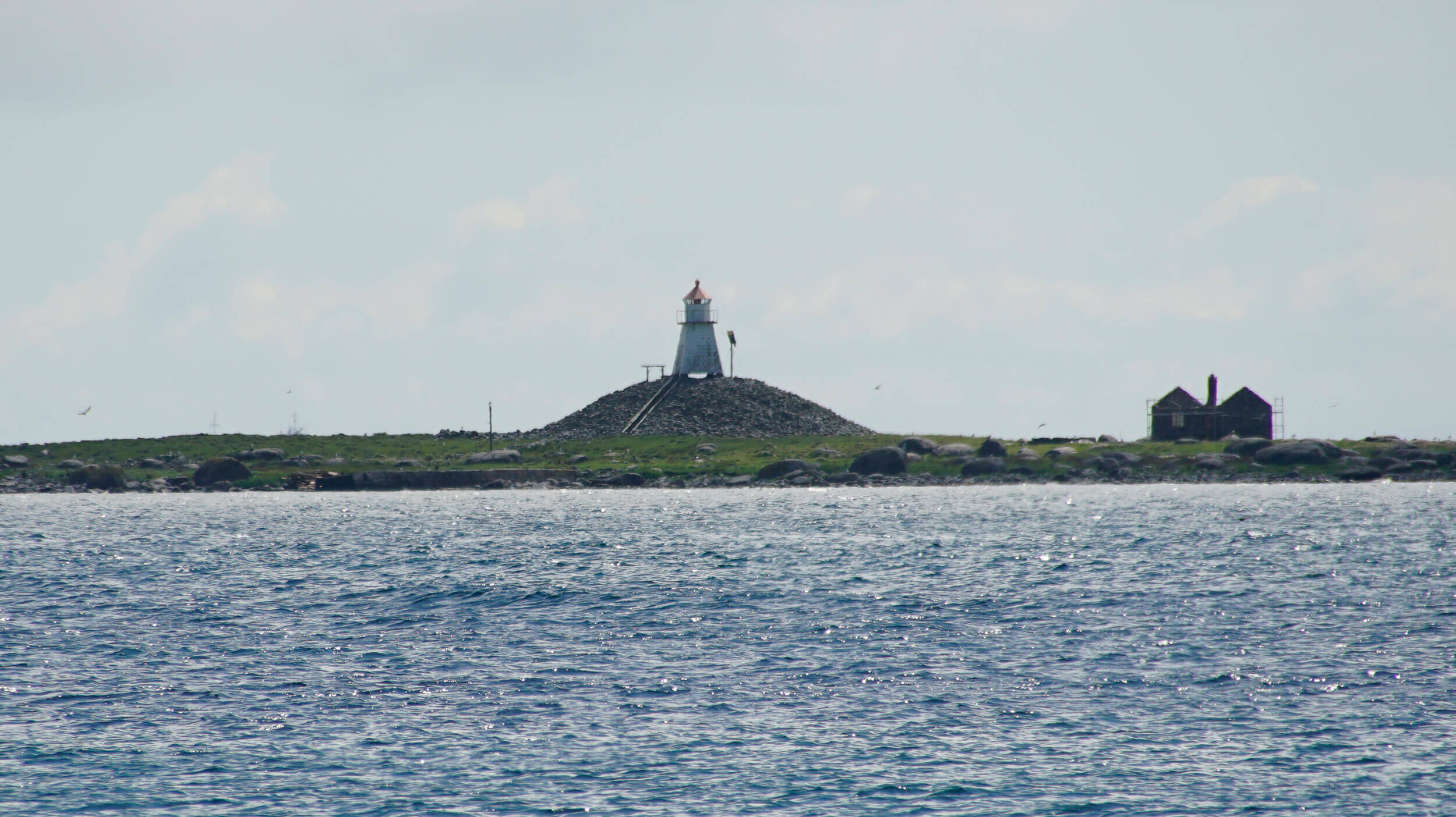 Leuchtturm Fotovorlage zum Abzeichnen an der Küste 1